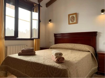 Casa emigrantes / Apartamentos Arunda