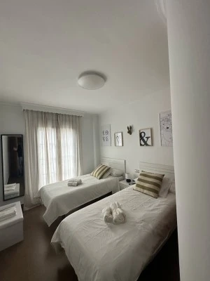 El pasaje / Apartamentos Arunda